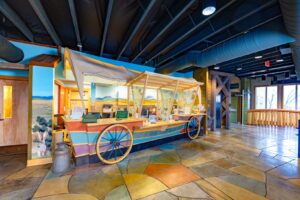 Cultural display of a covered wagon in lobby